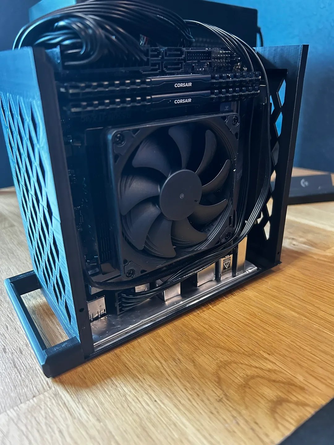 Inside the case showing the low profile CPU cooler, Corsair RAM and routed cables against the printed skeleton